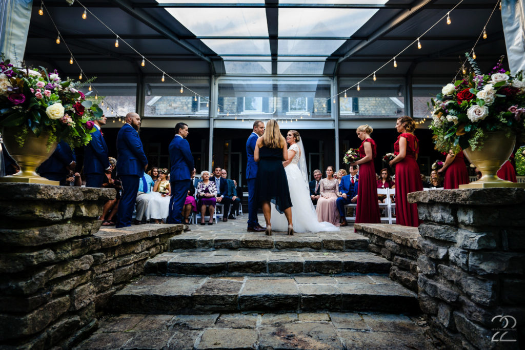 Man and woman say wedding vows at Krippendorf Lodge in Cincinnati by Cincinnati Wedding Photographer Studio 22 Photography